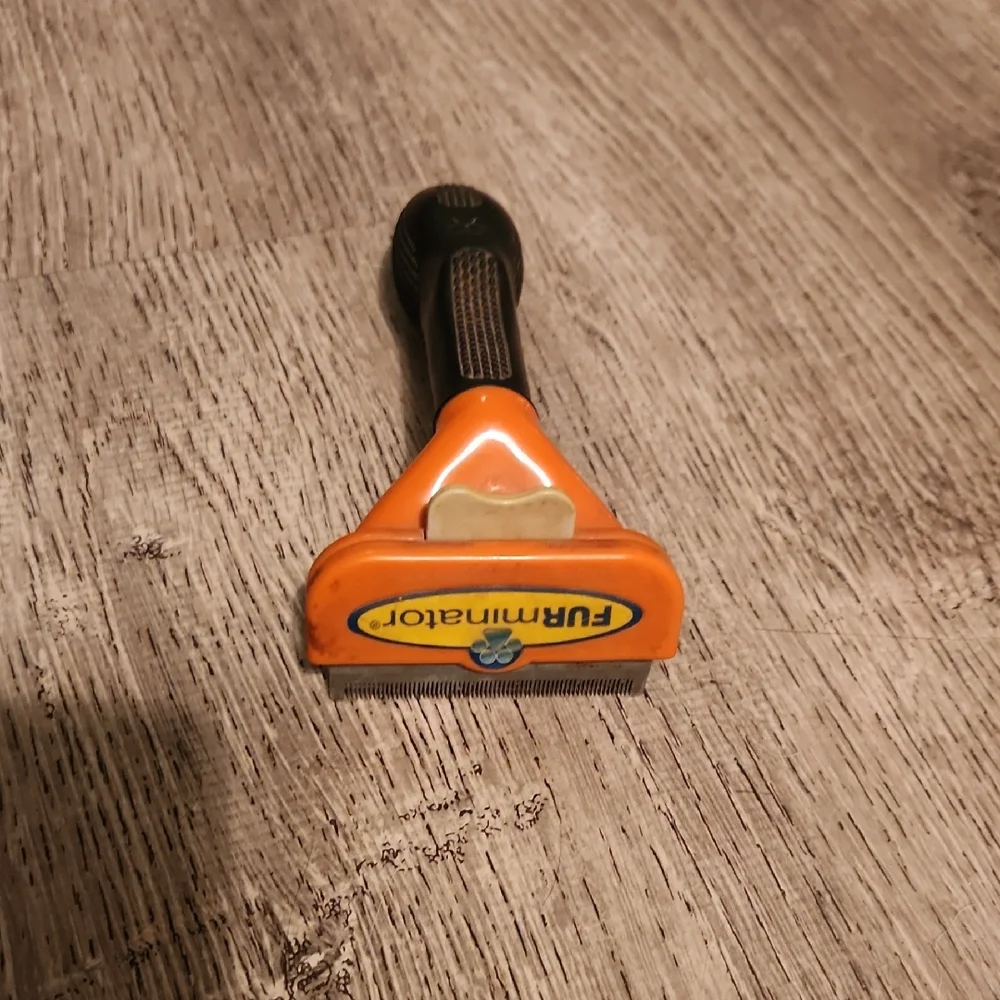 FURminator Orange Shedding Tool
